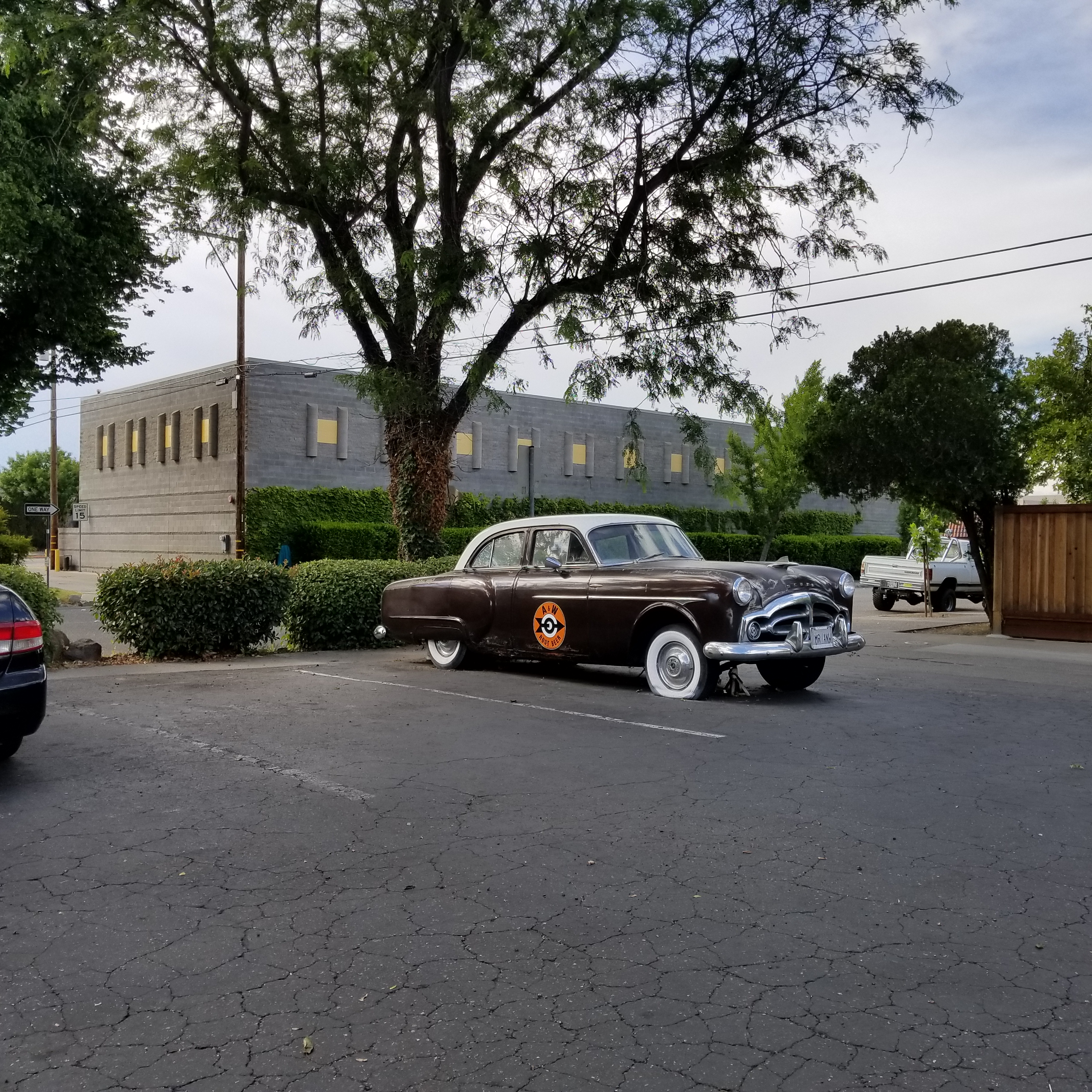 A & W Drive In mascot with flat tire