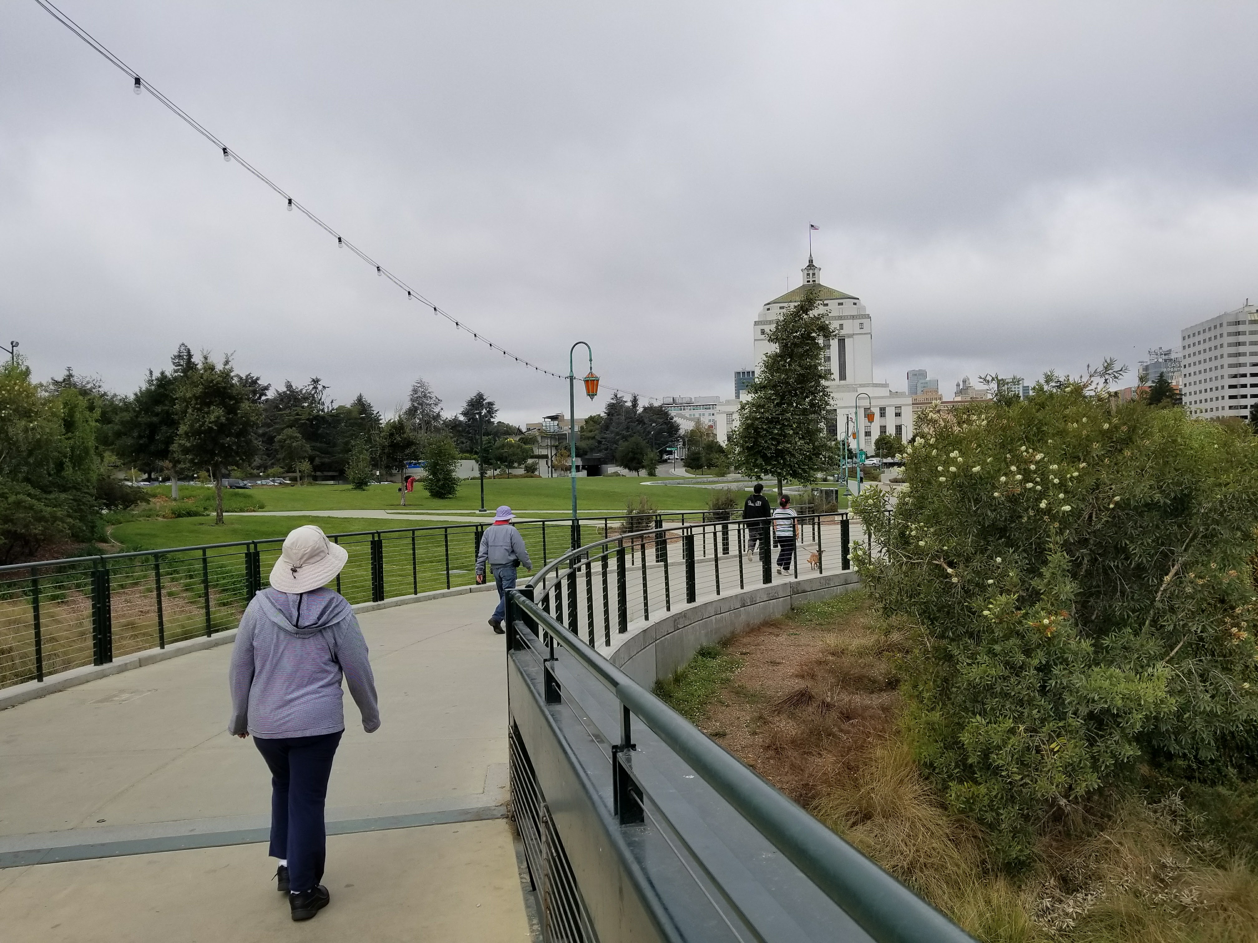 Moving counterclockwise, away from Oakland Courthouse along newly installed path at Southwest corner of lake near 1200 Lakeshore 